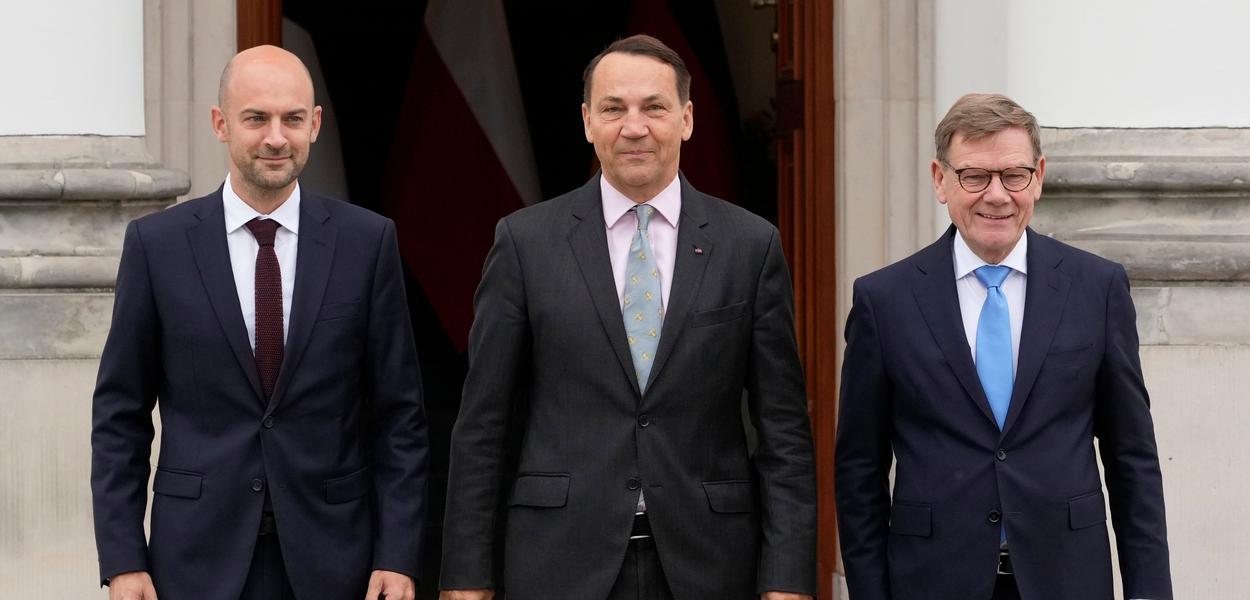 Žan-Noel Baro, Radoslav Sikorski i Johan Vadeful (Foto: AP/Czarek Sokolowski)